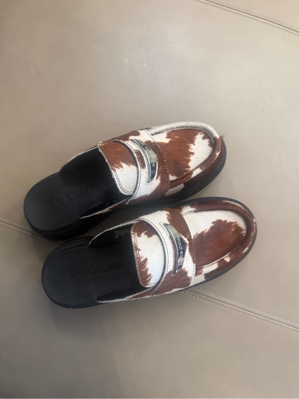 Jordan Cowhide Pattern Slip-On Loafers in Brown and White